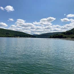 The Allegheny Reservoir (Kinzua Lake) is a sprawling, scenic lake on the PA/NY border, perfect for boating, fishing, swimming, and camping, with miles of forested shoreline and stunning views.